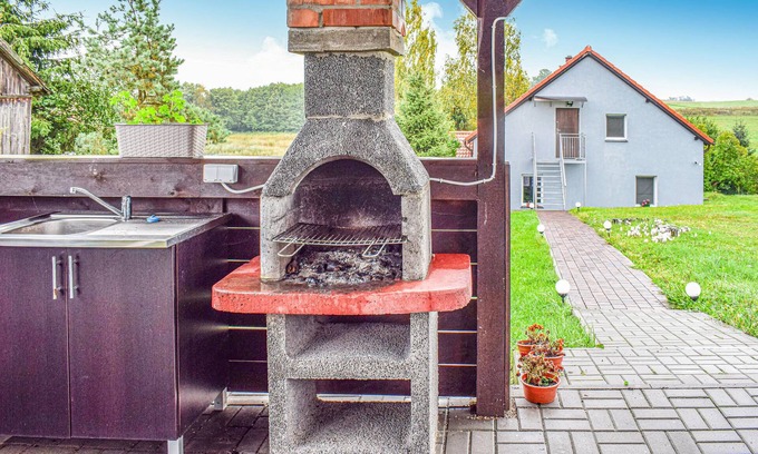 Biskupiec Apartment | This cozy vacation apartment is located in the Polish village of Najdymowo.