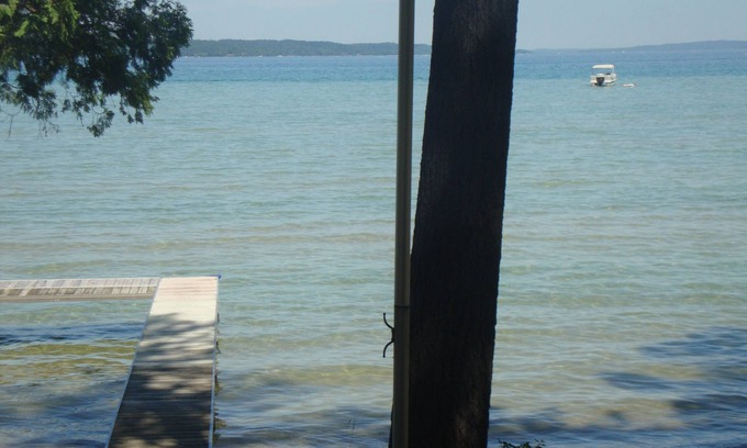 Rapid City Cottage | TORCH LAKE WATERFRONT HOME AVAILABLE AUG 17-24 AND AUG 24-31, 2024!