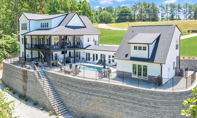 Moneta House | Tranquil Shores Estate, Luxury Lakefront Compound w/Heated Salt Pool, Hot Tub, Dock!