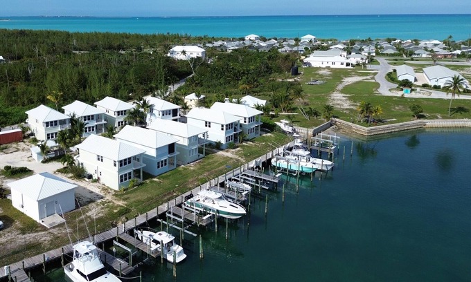 Treasure Cay House | Treasure Cay Getaway with BOAT DOCK! n4 bedroom, pool, & bbq Cabana!
