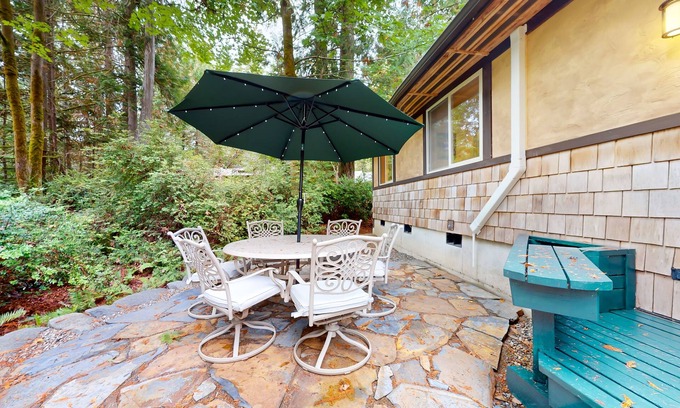 Burley House | Tree-lined retreat with wood fireplace, board game collection, & pool access