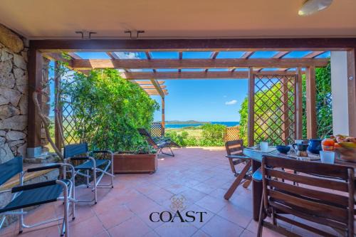 Portisco Apartment | Trilocale con giardino e vicino alla spiaggia