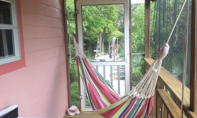 Morris Settlement Cottage | Tropical Hideaway - walk to the beach! FALL SPECIAL!