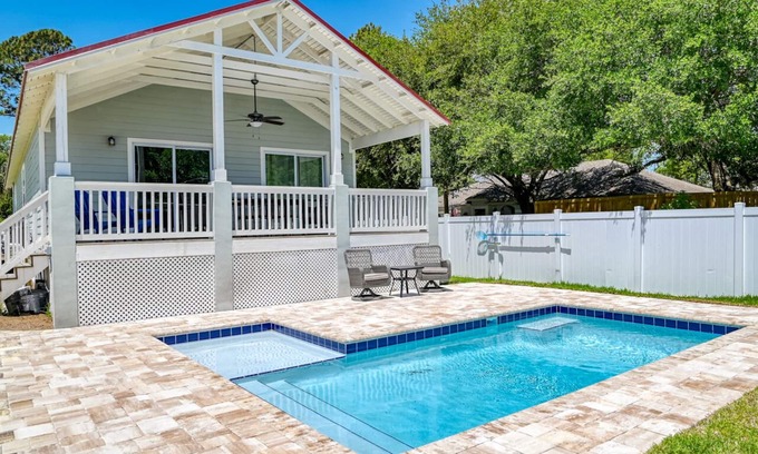 Butler Beach House | Tropical Winds - Heated Pool & Firepit! Walk to the Beach!