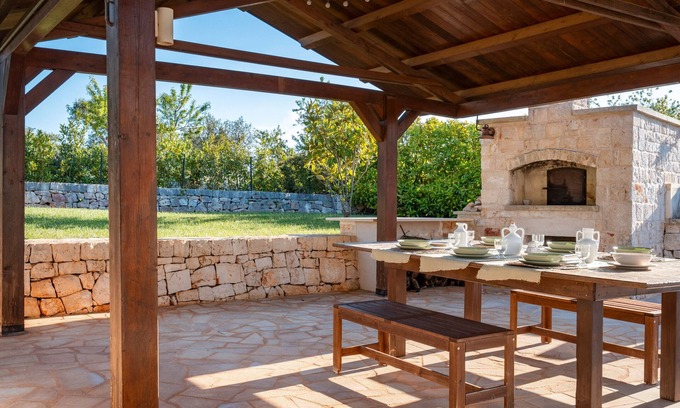 Castellana Grotte House | Trullo 'Relais' with Shared Terrace, Wi-Fi and Air Conditioning