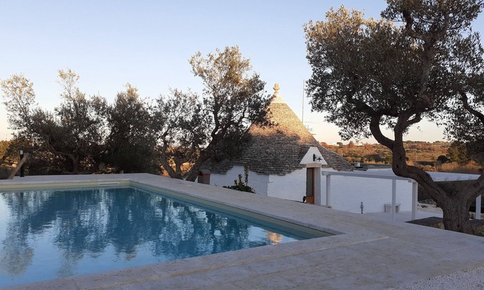 Alberobello House | Trullo surrounded by nature with a beautiful view a stone's throw from the center