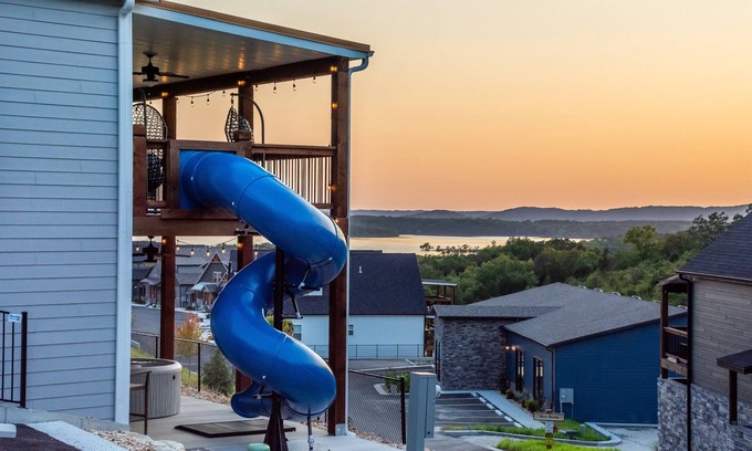 Table Rock House | Twisty slide, Lake view, Hot tub, Indoor pool, Fire pit | Skye Retreat