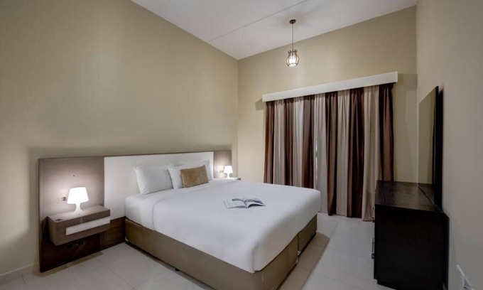 Dubai Investment Park Hotel | Two Bedroom Apartment Near Dunes Village Dip By Luxury Bookings