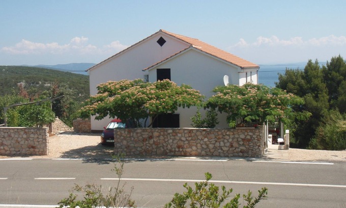 Zman Apartment | Two bedroom apartment with balcony and sea view Žman, Dugi otok (A-24325-a)