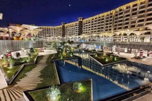 New Cairo Apartment | Unique duplex hotel apartment pool view