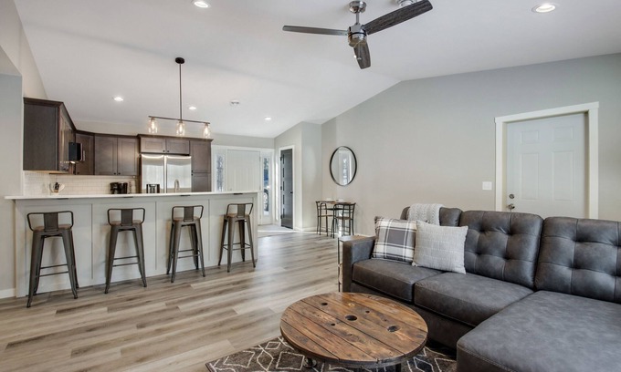 Cumberland Condo | Up North Living! Fully renovated one-level living home in wooded lot near lake.
