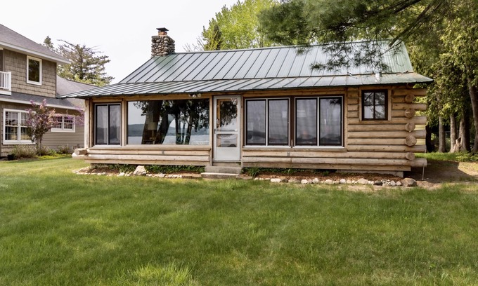 Cedar Cabin | Up North Log Cottage at Memo's Treasure With Private Lake Leelanau Waterfront