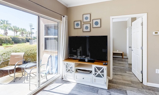 Frangista Beach Condo | Updated, beachside condo with dual suites, balcony & pool - walkable locale