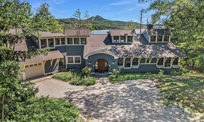 Cedar House | Updated! Elizabeth House is a Charming Craftsman on Little Traverse Lake.