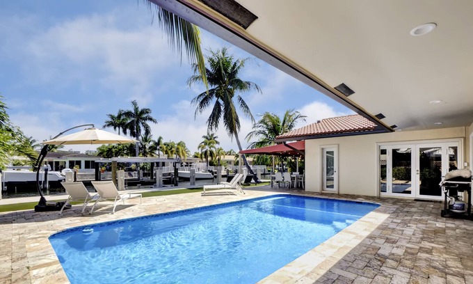 Pompano Isles House | Upscale, luxurious WATERFRONT pool home.