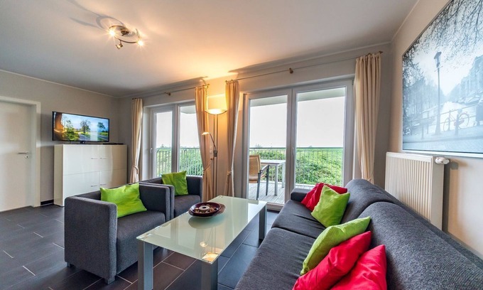 Schillig Apartment | Vacation apartment by the North Sea with a great balcony by the water and its own sauna