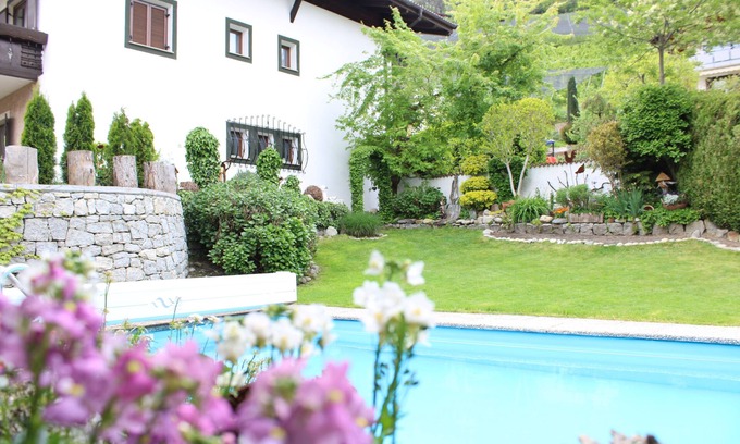 Rifiano Apartment | Vacation apartments Innerhofer west-facing balcony apartment, shared garden and pool