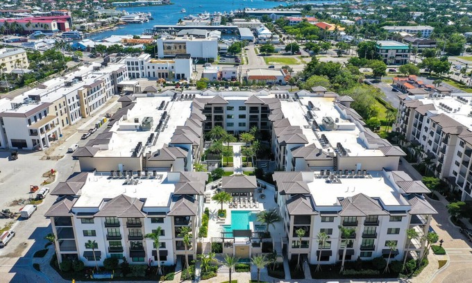 Redevelopment Area Condo | Vacation at the amazing NEW Quattro at Naples Square in the Heart of Downtown Naples!