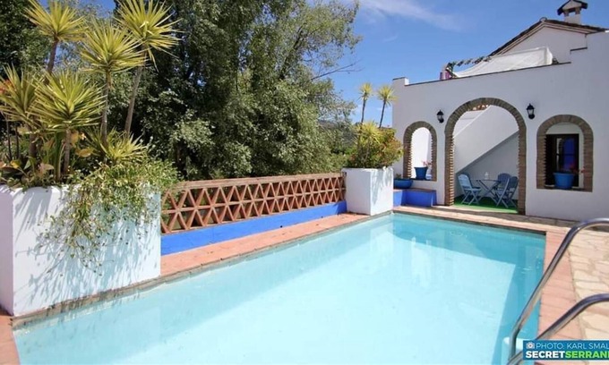 Cortes de la Frontera House | Vacation Home Casa del Rio Riverside Retreat with Mountain View, Pool & Wi-Fi