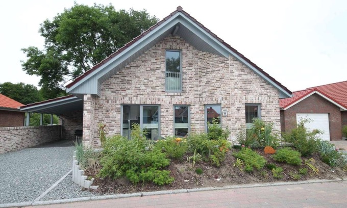 Pelzerhaken House | Vacation home near the beach for 6 people and dog with fireplace & garden in a quiet location.