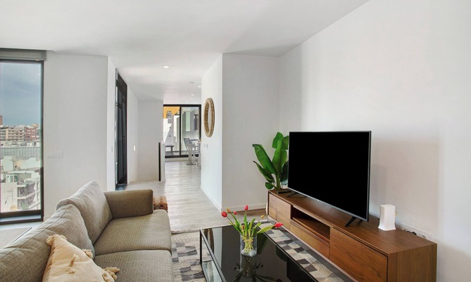 Las Palmas de Gran Canaria House | Vacation Home 'Penthouse Aliseo On The Beach' with Sea View, Private Terrace and Wi-Fi