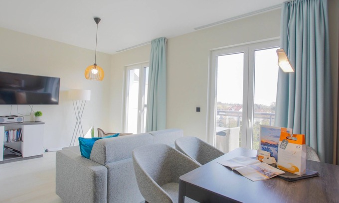 Ostseebad Wustrow Apartment | Vacation in the vacation apartment Sommerzeit on the Bodden and the Baltic Sea with an east-facing balcony