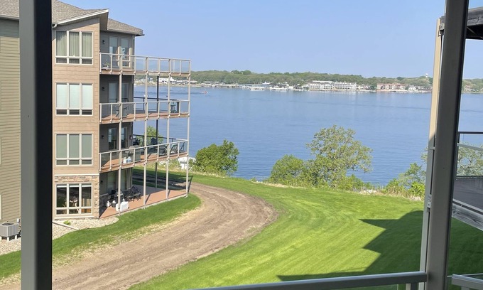 Arnolds Park Condo | Vacation Ready Condo - Great Views of East Lake Okoboji & Overlooks Newport Pool