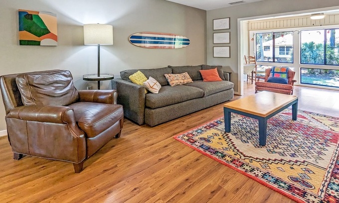 Ocean Ridge Cottage | Vibrant, Waterfront Home with Free WiFi, Full Kitchen, Gas Grill, & A/C