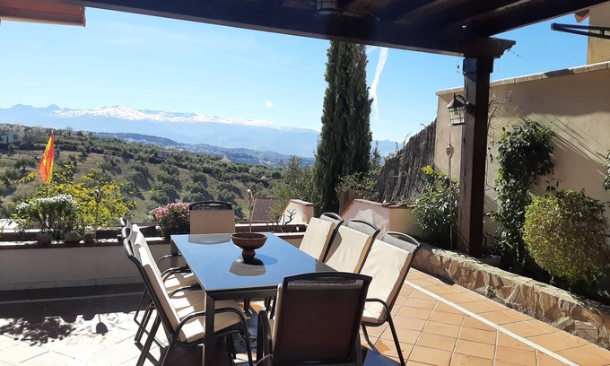 Nivar Ski Chalet | Villa Alfaguara is a rural house with views of the Sierra Nevada for 14 people