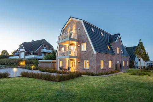 Timmendorfer Strand Apartment | Villa Dornkamp 1 - Luxuriöse Ferienwohnung für 4 Personen inklusive Sauna und Garten