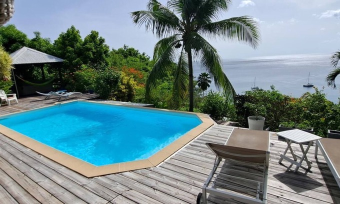 Pointe-Noire Villa | Villa Kaz in Thomy, pool and Spa Panoramic sea view of Pointe Noire bay