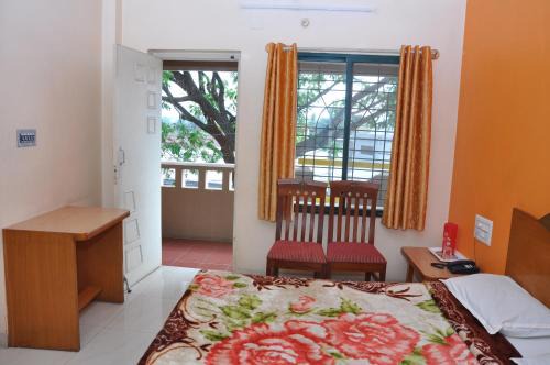 Kushalnagar Hotel | Vinayaka Deluxe Lodge