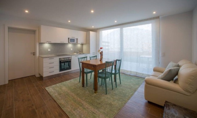 Giubiasco Apartment | Walnut apartment surrounded by greenery