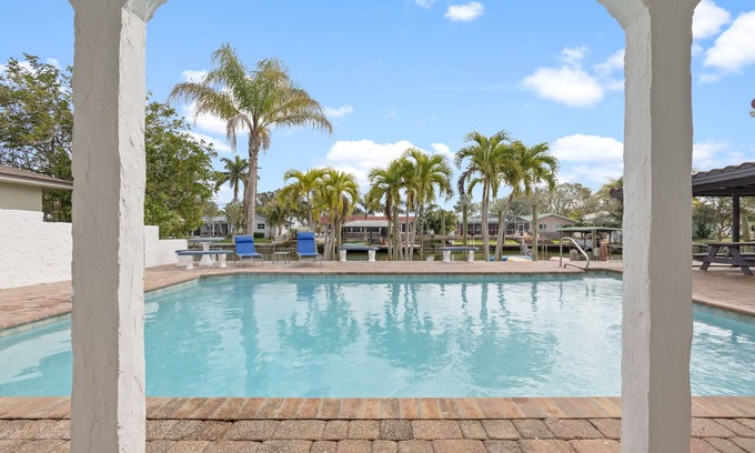 Cocoa Beach House | Water's Edge Retreat with Pool, Hot Tub & Game Room. 3 minutes to the Beach!