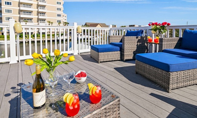 Holiday Isle Condo | Water Views! Pets Welcome, 42' Private Boat Slip on Canal, 2 Kings, Walk 2 Private Beach, Townhome