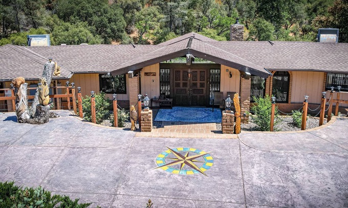 Oakhurst House | Waterfall View Retreat near Yosemite. Sleeps 21, Hot Tub,Swimming Spa, Game Room