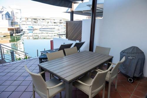 Waterfront Apartment | Waterfront - 2BR Oasis with mooring and Lagoon views with direct access to the water