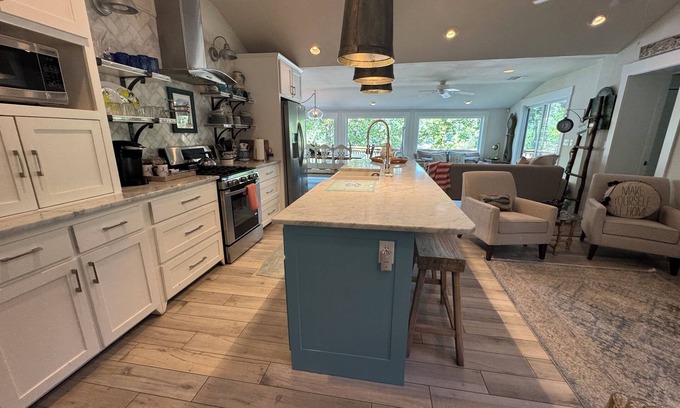 Vinita House | Waterfront beauty with dock and fireplace! Check in Bay! New Hot Tub!