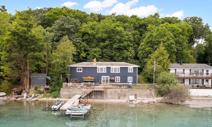 Traverse City House | Waterfront Entertaining with hot tub in wine country