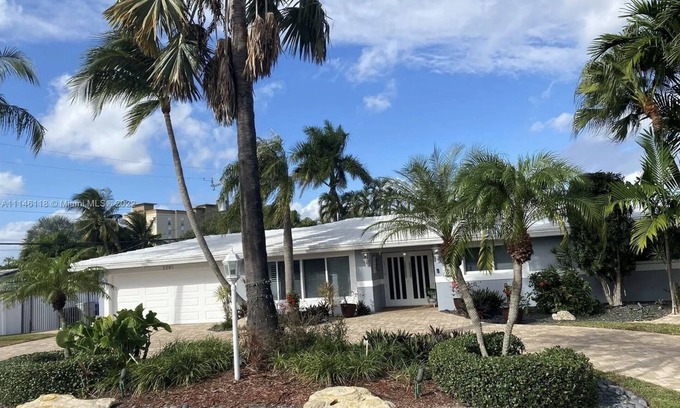 Garden Isles House | Waterfront, heated Pool enclosed, our home is completely renovated, very private