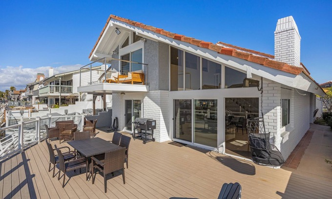 Channel Islands House | Waterfront home with kayaks, grill, Pac-Man, AC, balconies, & smart TVs