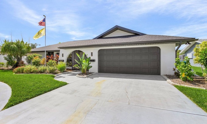 Cape Coral House | Waterfront living - Sleeps 16, Two Heated Pools - 2 Tickets to Paradise - Roelens
