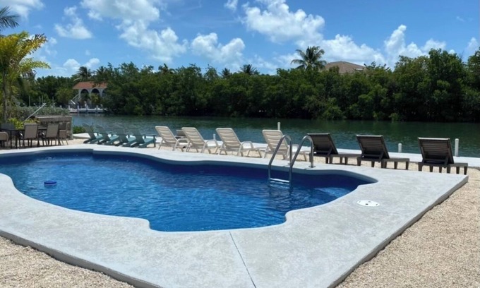 Marathon House | Waterfront Private Home-7 BR, 6 Full BA, Pool, 80' Dock, Parking, Screened Porch