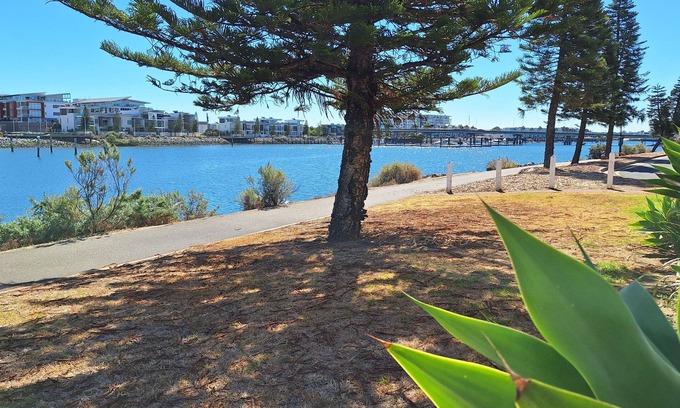 New Port Apartment | Waterfront Property with lovely views. Wake up to the dolphins and Swimming
