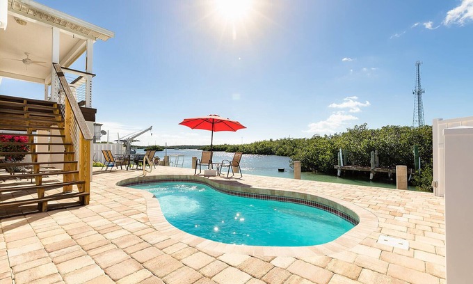 Marathon House | WATERFRONT, VIEWS, HEATED POOL, 130 ft. OF DOCK, PRIVATE RETREAT