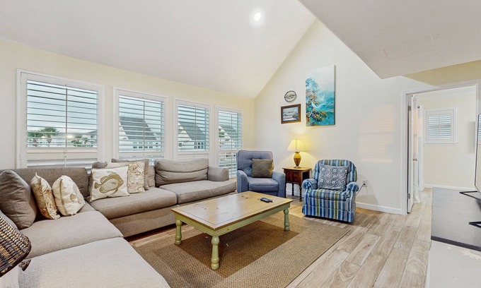 Holiday Isle Villa | Waterfront villa with multi level home, shared pool & easy beach access