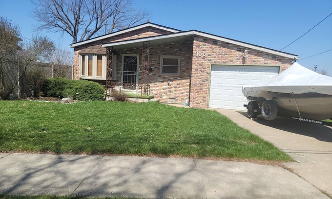 Wyandotte House | Waterfront with Boat Dock on Detroit River Channel. Fish from the backyard