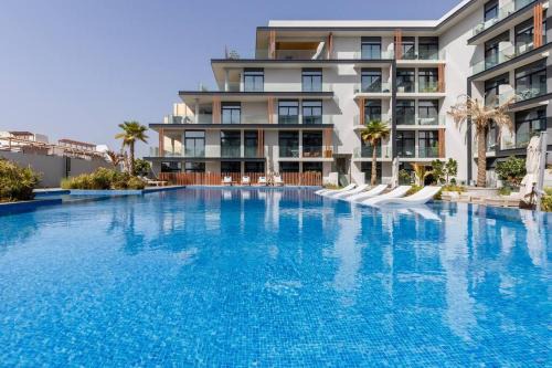 Jumeirah Village Circle Apartment | Waves - Elegant Oxford 212 Studio in JVC with City Views