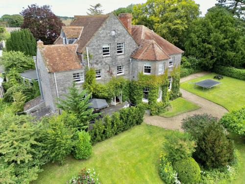 Somerton Apartment | Welcome to Hazelwood, The Mount Somerton's unique sunny Apartment - modern and fully equipped, Private off-street parking, Near Glastonbury Tor, The spectacular Wells Cathedral, Stourhead Sherborne Abbey, Millfield School, Clarkes Village