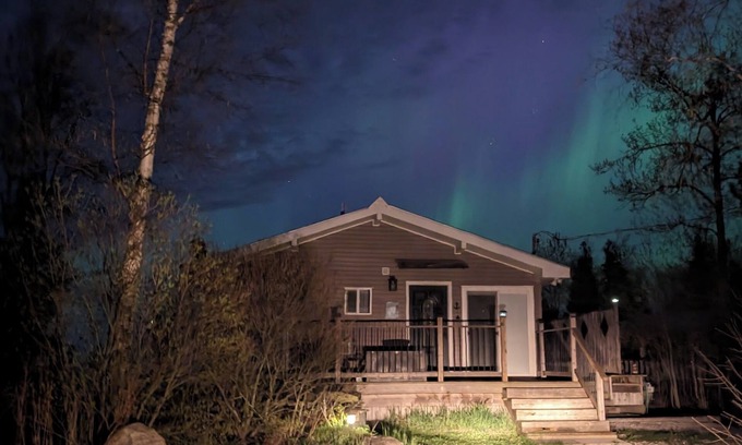 Tobermory House | Welcome to Sunset Cove — a serene waterfront cottage near Tobermory, where turquoise waters meet star-filled skies. Enjoy sunsets, Northern Lights, a private dock, and cozy nights by the fire. Your unforgettable escape awaits.